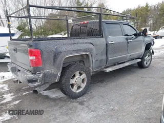 2016 GMC Sierra 2500HD Denali z VIN 1GT12UE81GF128498, wystawiony jako IAAI lot #41346398 z przebiegiem 164 532 mil mil oraz . Historia ofert i sprzedaży dostępna na DreamBid. Obrazek 4.