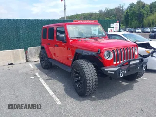 2021 Jeep Wrangler Unlimited Sahara z VIN 1C4HJXEGXMW631033, wystawiony jako IAAI lot #42550070 z przebiegiem 54 429 mil mil oraz . Historia ofert i sprzedaży dostępna na DreamBid. Obrazek 1.