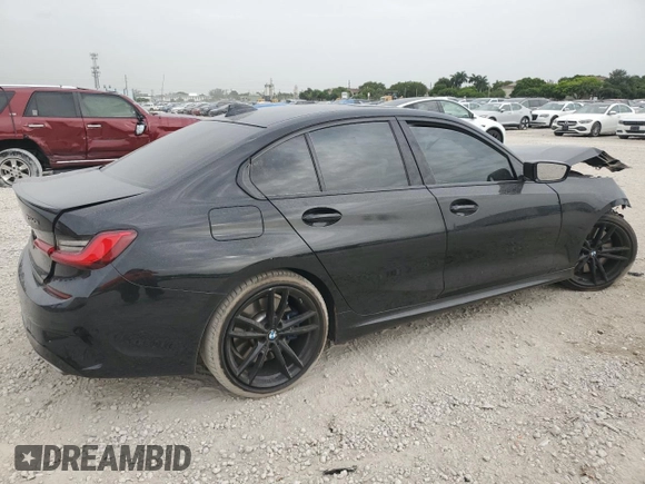 2020 BMW 3 Series M340i with VIN 3MW5U7J01L8B26649, listed as a Copart auction lot 62209814 with 49,731 mi miles and Salvage Title. Bid and sale history available at carsss.com. Image 3.
