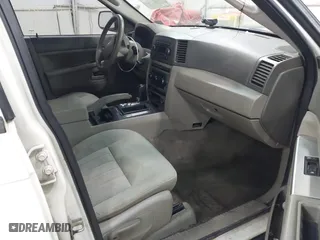 2006 Jeep Grand Cherokee Laredo with VIN 1J8GR48K06C163877, listed as a IAAI auction lot 41971240 with 250,544 mi miles. Bid and sale history available at carsss.com. Image 5.