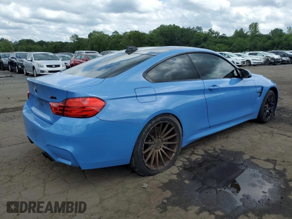 2015 BMW M4 with VIN WBS3R9C57FK332148, listed as a Copart auction lot 64934594 with 72,669 mi miles and Salvage Title. Bid and sale history available at carsss.com. Image 3.