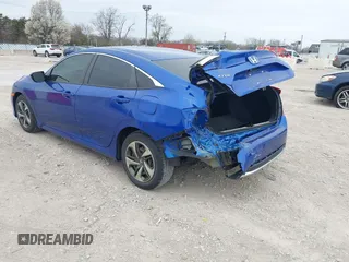 2020 Honda Civic LX with VIN 2HGFC2F69LH550744, listed as a IAAI auction lot 42079594 with 34,724 mi miles and . Bid and sale history available at DreamBid. Image 3.