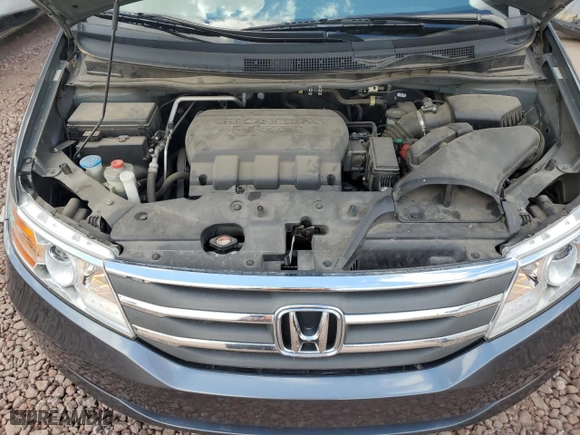 2012 Honda Odyssey LX with VIN 5FNRL5H21CB013296, listed as a Copart auction lot 48512625 with 69,381 mi miles and Salvage Title. Bid and sale history available at carsss.com. Image 12.