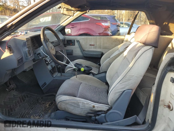1988 Chevrolet Cavalier with VIN 1G1JF31WXJ7214292, listed as a Copart auction lot 87275184 with Not Provided miles and Salvage Title. Bid and sale history available at DreamBid. Image 7.