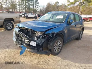 2023 Mazda CX-5 2.5 S with VIN JM3KFBAM3P0284827, listed as a IAAI auction lot 41321041 with 19,780 mi miles. Bid and sale history available at carsss.com. Image 17.