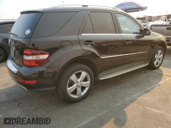 2009 Mercedes-Benz M 3.5L with VIN 4JGBB56E49A525018, listed as a Copart auction lot 41614175 with 154,428 mi miles and Salvage Title. Bid and sale history available at carsss.com. Image 3.