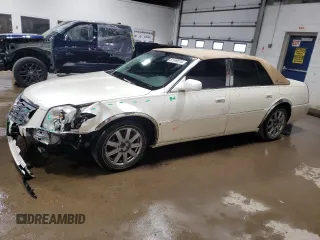 2008 Cadillac DTS 1SA z VIN 1G6KD57YX8U180665, wystawiony jako Copart lot #52109515 z przebiegiem 119 138 mil mil oraz Szkody całkowita. Historia ofert i sprzedaży dostępna na DreamBid. Obrazek 1.