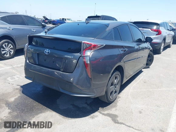 2017 Toyota Prius Two with VIN JTDKARFU1H3534154, listed as a IAAI auction lot 42531808 with 123,954 mi miles and . Bid and sale history available at DreamBid. Image 4.