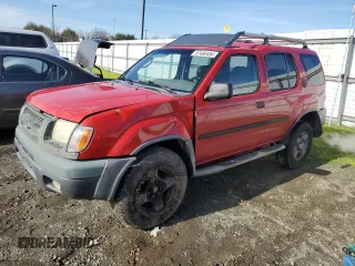 2001 Nissan Xterra XE with VIN 5N1ED28T11C565485, listed as a Copart auction lot 87490404 with 238,044 mi miles and Salvage Title. Bid and sale history available at DreamBid. Image 1.