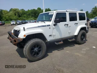 2014 Jeep Wrangler Unlimited Sahara z VIN 1C4BJWEG6EL188527, wystawiony jako Copart lot #60300585 z przebiegiem 105 666 mil mil oraz Czysty tytuł • Clean title. Historia ofert i sprzedaży dostępna na DreamBid. Obrazek 1.
