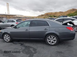 2010 Toyota Avalon XL with VIN 4T1BK3DB2AU368105, listed as a IAAI auction lot 40966346 with 147,122 mi miles and . Bid and sale history available at DreamBid. Image 14.