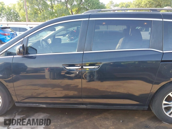 2013 Honda Odyssey EX-L with VIN 5FNRL5H6XDB090768, listed as a IAAI auction lot 42008759 with 116,052 mi miles and . Bid and sale history available at carsss.com. Image 14.