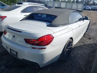 2018 BMW 6 Series 640i with VIN WBA6F1C5XJGT83781, listed as a IAAI auction lot 41945616 with 46,370 mi miles and . Bid and sale history available at carsss.com. Image 4.