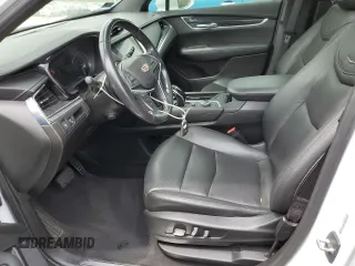 2020 Cadillac XT5 Premium Luxury FWD with VIN 1GYKNCRS5LZ229686, listed as a Copart auction lot 57391915 with 54,491 mi miles and Salvage title. Bid and sale history available at DreamBid. Image 7.