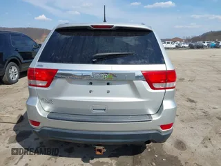 2013 Jeep Grand Cherokee Laredo with VIN 1C4RJFAG5DC634685, listed as a IAAI auction lot 41792147 with 260,594 mi miles. Bid and sale history available at carsss.com. Image 16.