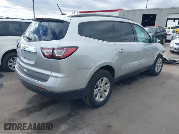 2013 Chevrolet Traverse LT with VIN 1GNKVGKD6DJ240146, listed as a IAAI auction lot 41665024 with 118,648 mi miles and . Bid and sale history available at DreamBid. Image 4.