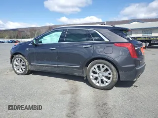 2017 Cadillac XT5 Luxury AWD with VIN 1GYKNDRS1HZ243825, listed as a Copart auction lot 52302665 with 115,674 mi miles and Salvage Title. Bid and sale history available at carsss.com. Image 2.