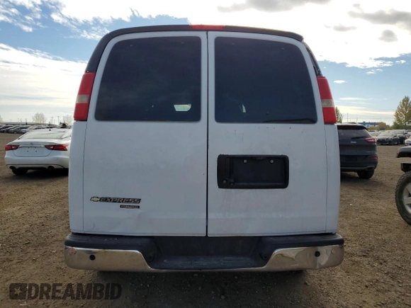 2013 Chevrolet Express Passenger 1LT z VIN 1GAZGYFG4D1140342, wystawiony jako Copart lot #75170404 z przebiegiem 201 580 mil mil oraz Czysty tytuł • Clean title. Historia ofert i sprzedaży dostępna na DreamBid. Obrazek 6.