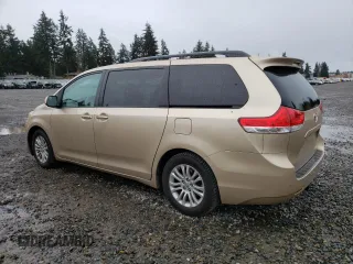 2011 Toyota Sienna XLE AAS with VIN 5TDYK3DC7BS124835, listed as a Copart auction lot 52324145 with 119,260 mi miles and Salvage Title. Bid and sale history available at carsss.com. Image 2.