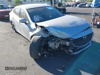 2017 Mazda 3 Touring z VIN JM1BN1V72H1106185, wystawiony jako IAAI lot #42697405 z przebiegiem 110 324 mil mil oraz . Historia ofert i sprzedaży dostępna na DreamBid. Obrazek 1.