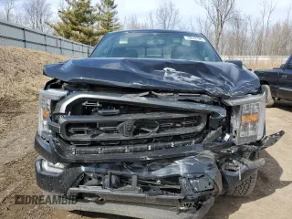 2023 Ford F-150 XL with VIN 1FTEW1EP5PKD18002, listed as a Copart auction lot 49512185 with 23,260 mi miles and Clean Title. Bid and sale history available at carsss.com. Image 5.
