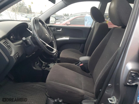2009 Kia Sportage LX with VIN KNDJF723997613404, listed as a Copart auction lot 75807714 with 65,200 mi miles and Clean Title. Bid and sale history available at carsss.com. Image 7.