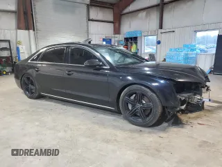 2013 Audi A8 4.0L z VIN WAUR2AFD5DN017108, wystawiony jako Copart lot #56350095 z przebiegiem 143 033 mil mil oraz Nie do naprawy • Non repairable. Historia ofert i sprzedaży dostępna na DreamBid. Obrazek 4.