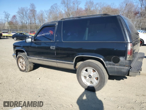 1998 Chevrolet Tahoe z VIN 3GNEK18R9WG123185, wystawiony jako Copart lot #53020915 z przebiegiem 310 261 mil mil oraz Nie do naprawy • Non repairable. Historia ofert i sprzedaży dostępna na DreamBid. Obrazek 2.