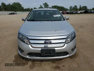 2011 Ford Fusion Hybrid with VIN 3FADP0L32BR129675, listed as a Copart auction lot 60911265 with 200,193 mi miles and Salvage title. Bid and sale history available at DreamBid. Image 5.