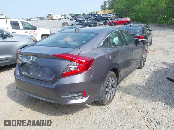 2017 Honda Civic EX z VIN 19XFC2F78HE227408, wystawiony jako IAAI lot #42122570 z przebiegiem 143 789 mil mil oraz . Historia ofert i sprzedaży dostępna na DreamBid. Obrazek 4.