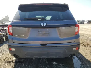 2019 Honda Passport EX-L with VIN 5FNYF7H58KB003906, listed as a Copart auction lot 46312795 with 59,417 mi miles and Salvage Title. Bid and sale history available at carsss.com. Image 6.