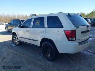 2007 Jeep Grand Cherokee Laredo with VIN 1J8HS48PX7C657685, listed as a IAAI auction lot 41748528 with 247,534 mi miles. Bid and sale history available at carsss.com. Image 3.