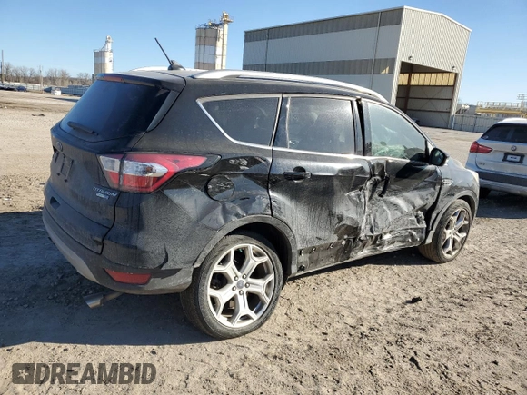 2018 Ford Escape Titanium with VIN 1FMCU9J95JUA36324, listed as a Copart auction lot 47131825 with 63,563 mi miles and Salvage title. Bid and sale history available at DreamBid. Image 3.