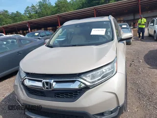 2018 Honda CR-V Touring with VIN 5J6RW2H96JL000910, listed as a IAAI auction lot 42490580 with 201,534 mi miles and . Bid and sale history available at DreamBid. Image 12.