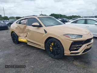 2022 Lamborghini Urus z VIN ZPBUA1ZL3NLA18265, wystawiony jako IAAI lot #40675659 z przebiegiem 46 439 mil mil oraz . Historia ofert i sprzedaży dostępna na DreamBid. Obrazek 1.
