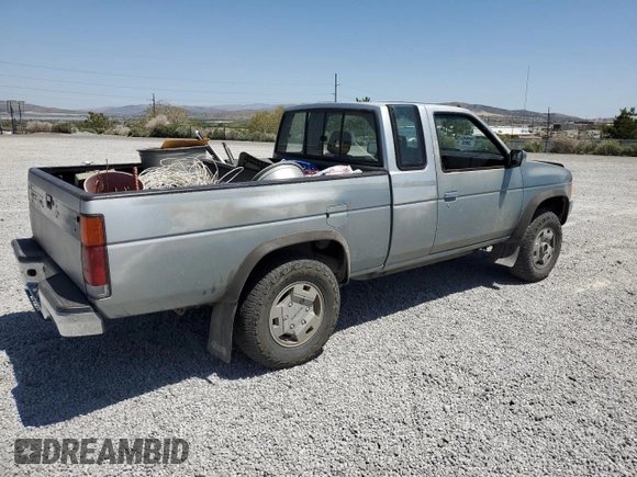 1993 Nissan Frontier SE with VIN 1N6HD16Y9PC430786, listed as a Copart auction lot 56333545 with 262,505 mi miles and Salvage title. Bid and sale history available at DreamBid. Image 3.