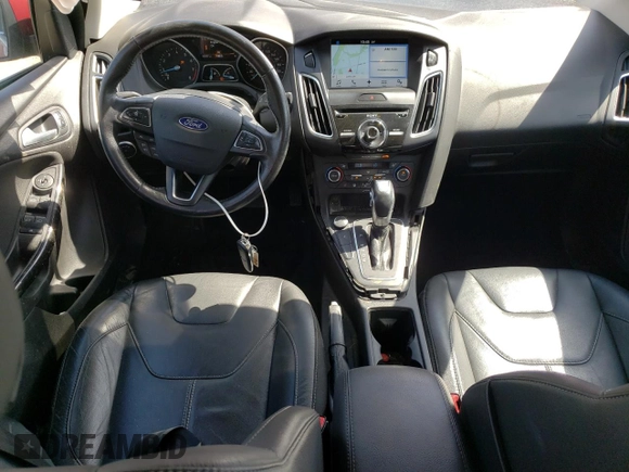 2016 Ford Focus Titanium z VIN 1FADP3J24GL272970, wystawiony jako Copart lot #54539215 z przebiegiem 60 007 mil mil oraz Czysty tytuł • Clean title. Historia ofert i sprzedaży dostępna na DreamBid. Obrazek 8.