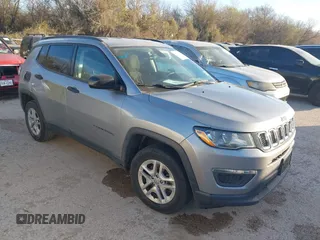 2018 Jeep Compass Sport with VIN 3C4NJCAB0JT124875, listed as a IAAI auction lot 41809953 with 136,018 mi miles. Bid and sale history available at carsss.com. Image 1.