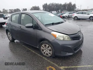 2013 Toyota Yaris L with VIN JTDKTUD39DD552185, listed as a IAAI auction lot 41577259 with 159,662 mi miles. Bid and sale history available at carsss.com. Image 1.