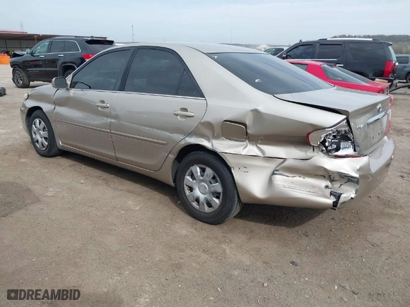2004 Toyota Camry LE with VIN 4T1BE32KX4U909903, listed as a IAAI auction lot 41824226 with 173,518 mi miles. Bid and sale history available at carsss.com. Image 3.