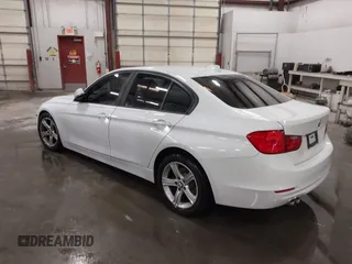 2014 BMW 3 Series 328i with VIN WBA3C1C52EK112194, listed as a IAAI auction lot 41694770 with 139,609 mi miles. Bid and sale history available at carsss.com. Image 3.