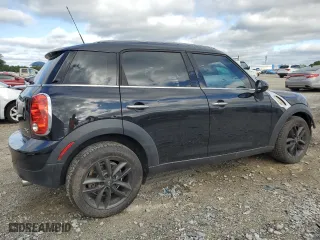 2013 MINI Cooper Countryman with VIN WMWZB3C58DWM07395, listed as a Copart auction lot 52193165 with 147,892 mi miles and Salvage Title. Bid and sale history available at carsss.com. Image 3.