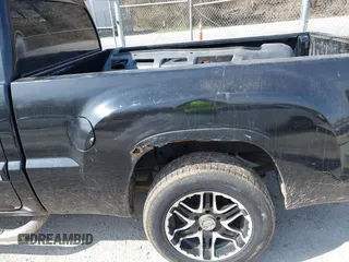 2006 Mitsubishi Raider LS with VIN 1Z7HC22K56S561574, listed as a IAAI auction lot 41757412 with 216,559 mi miles. Bid and sale history available at carsss.com. Image 20.