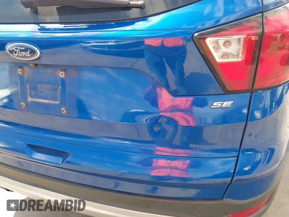 2019 Ford Escape SE with VIN 1FMCU0GD4KUB77720, listed as a IAAI auction lot 41681062 with 94,280 mi miles. Bid and sale history available at carsss.com. Image 18.