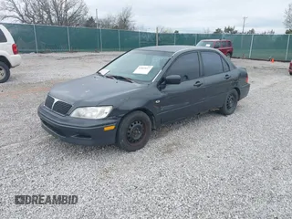 2003 Mitsubishi Lancer ES with VIN JA3AJ26E83U015342, listed as a IAAI auction lot 41819617 with 355,658 mi miles. Bid and sale history available at carsss.com. Image 2.