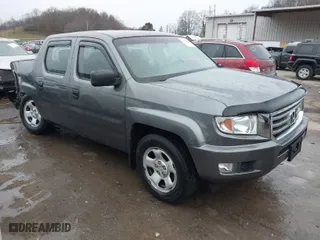 2012 Honda Ridgeline RT with VIN 5FPYK1F24CB456298, listed as a IAAI auction lot 40869948 with 123,329 mi miles. Bid and sale history available at carsss.com. Image 1.