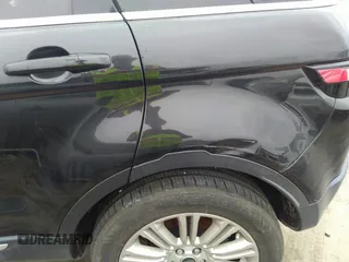 2013 Land Rover Range Rover Evoque Prestige Premium z VIN SALVV2BG3DH709471, wystawiony jako IAAI lot #41506662 z przebiegiem 136 519 mil mil oraz . Historia ofert i sprzedaży dostępna na DreamBid. Obrazek 16.