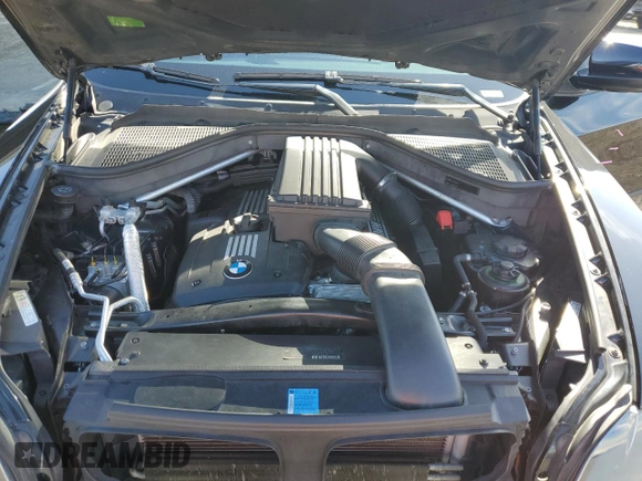 2008 BMW X5 3.0si z VIN 5UXFE43598L001053, wystawiony jako Copart lot #56243905 z przebiegiem 118 089 mil mil oraz Szkoda całkowita • Salvage title. Historia ofert i sprzedaży dostępna na DreamBid. Obrazek 12.