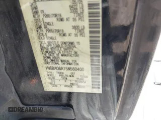 2005 Nissan Titan XE with VIN 1N6BA06A15N560400, listed as a IAAI auction lot 41656560 with 212,568 mi miles. Bid and sale history available at carsss.com. Image 9.