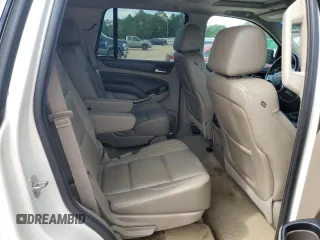 2015 Chevrolet Tahoe LT z VIN 1GNSCBKC5FR638002, wystawiony jako Copart lot #54857225 z przebiegiem 142 165 mil mil oraz Szkoda całkowita • Salvage title. Historia ofert i sprzedaży dostępna na DreamBid. Obrazek 11.